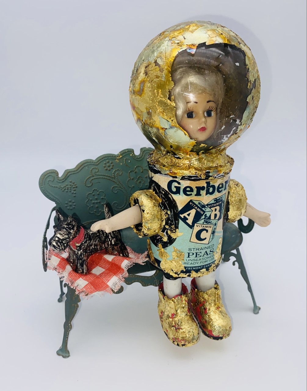 found object assemblage with doll