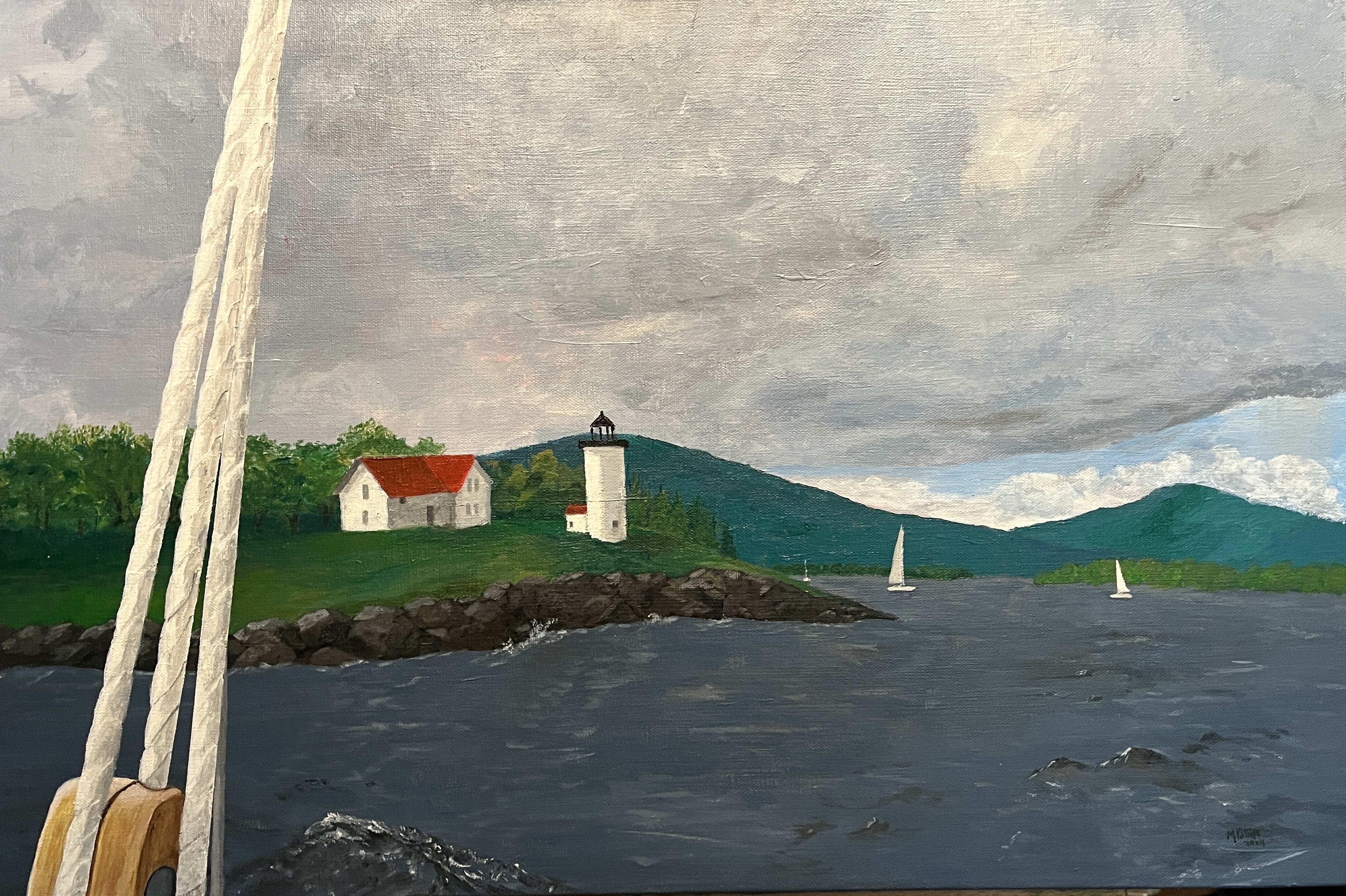 painting of lighthouse on shore line next to white house with red roof and green trees with sailboats, mountainous horizon in background, gray cloudy sky above, gray water in middle ground, and ropes from a boat in foreground